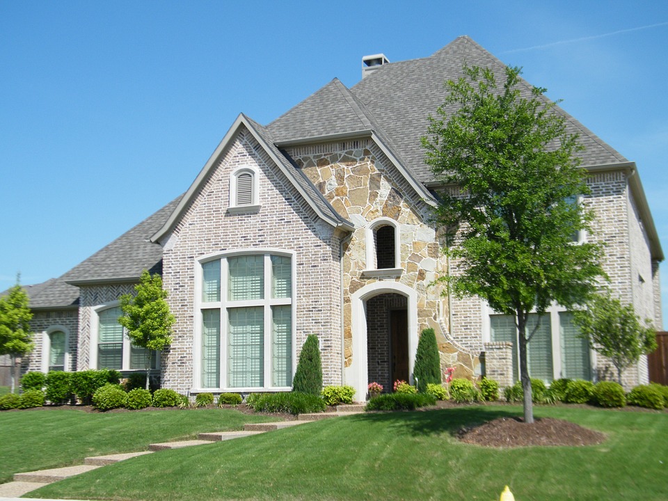 brick house with tree